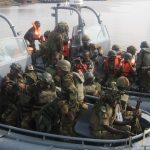 Reports The Nigerian military captures 23 suspected oil thieves and recovers more than 180,000 liters of stolen crude oil.