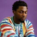 What might help Omah Lay overcome his sadness