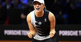 Swiatek advances to the Wimbledon final by swatting Bencic away