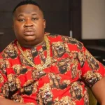Cubana chief priest responds to Hellen Atti’s paternity claims by saying, “Bring him to Nigeria.”