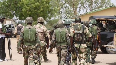 During operations throughout Nigeria, troops seize weapons, explosives, and drugs.