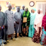 Gov. Mutfwang rewards a female Plateau pilgrim who returned missing $5,000 with N1 million.