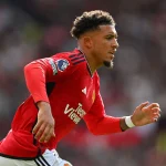 On transfer deadline day, Sancho stops Martinez from joining Manchester United.