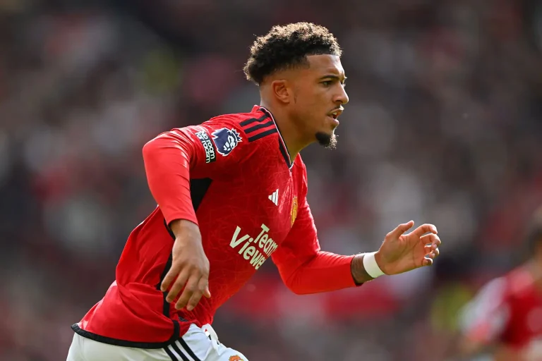 On transfer deadline day, Sancho stops Martinez from joining Manchester United.