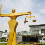 A court sentences a bank MD to five years in prison for fraud.