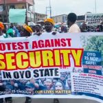 Protesters block traffic on Iwo Road and call for the release of teachers and students who have been kidnapped from Oyo.