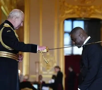 Actor Idris Elba gets knighted by King Charles III for his support of youth.